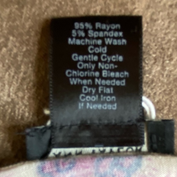 Ann Taylor flouncy top is in a fuchsia, tan and navy gypsy 70s print. Scoop. - Picture 7 of 7